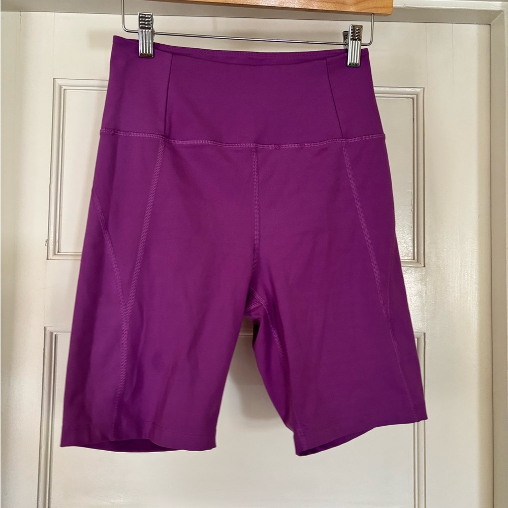 girlfriend collective high rise biker short purple size m